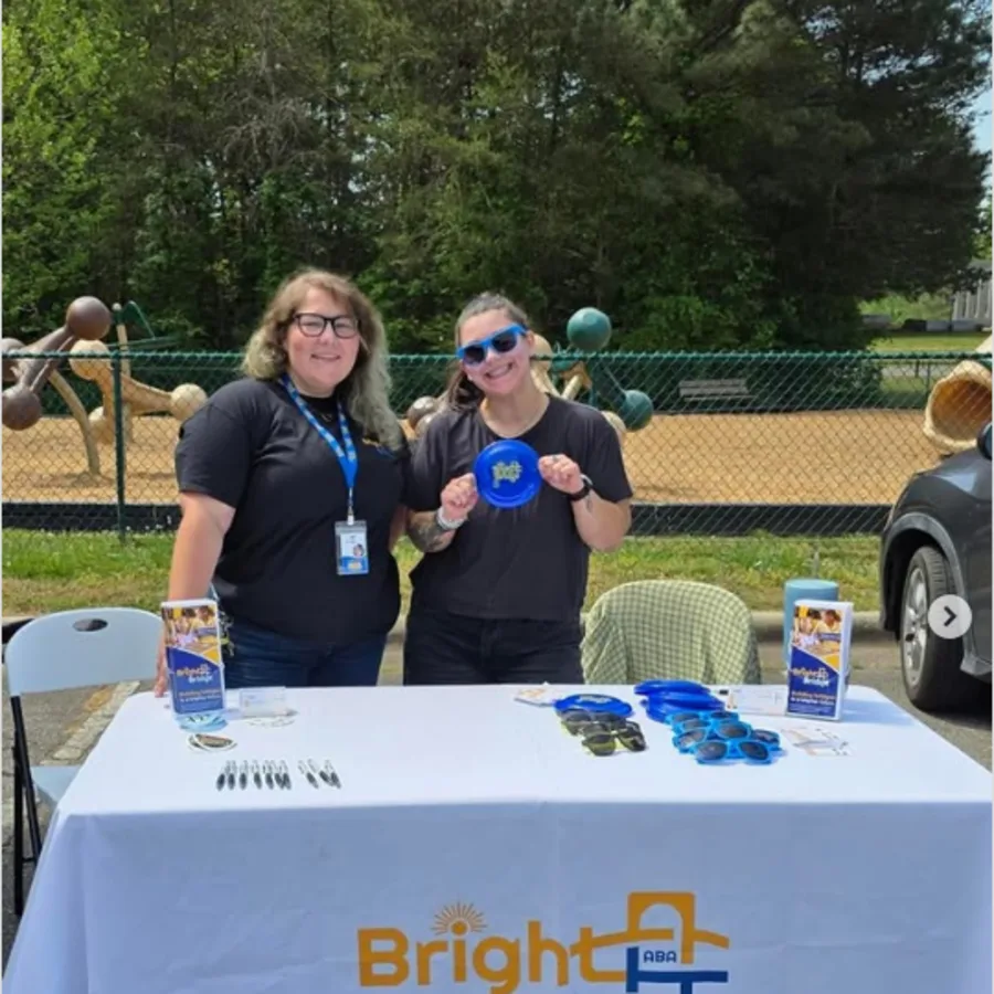 BrightBridge ABA team members at an outdoor community table