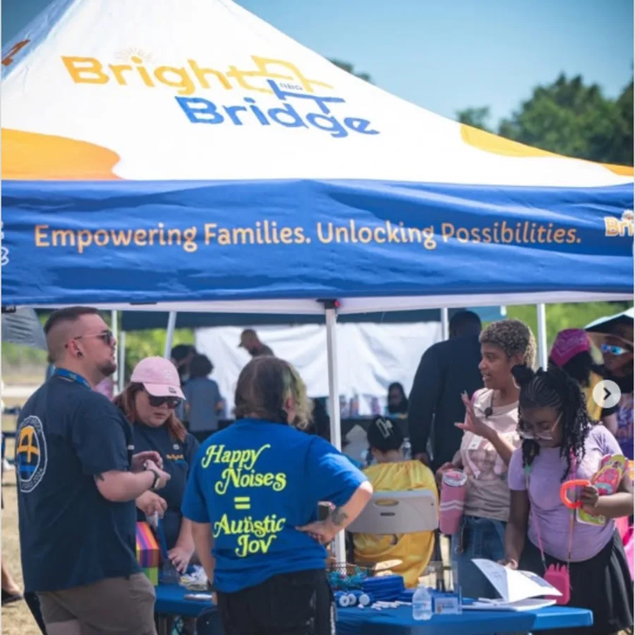 BrightBridge ABA community event tent at a Fayetteville gathering