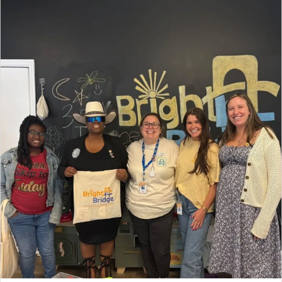 BrightBridge ABA team members standing together during a community visit