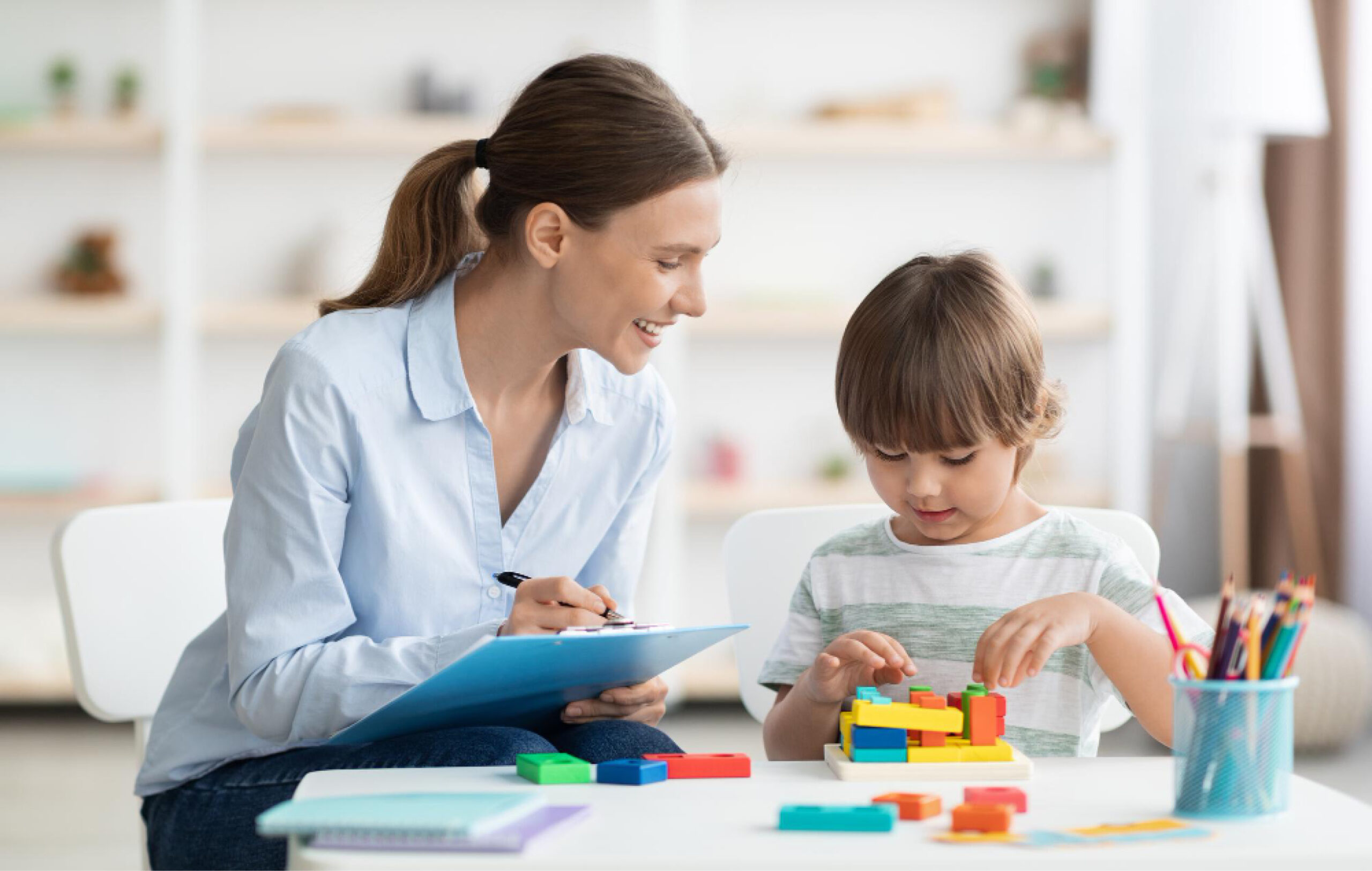 BCBA, parents, and therapists collaborating on a child's ABA treatment plan